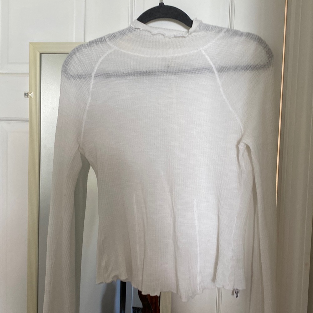 FREE PEOPLE sheer white mock-neck top with ruffle detailing